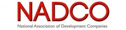 A red logo for the association of development professionals.