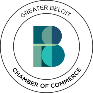 A white circle with the words greater beloit chamber of commerce in black.