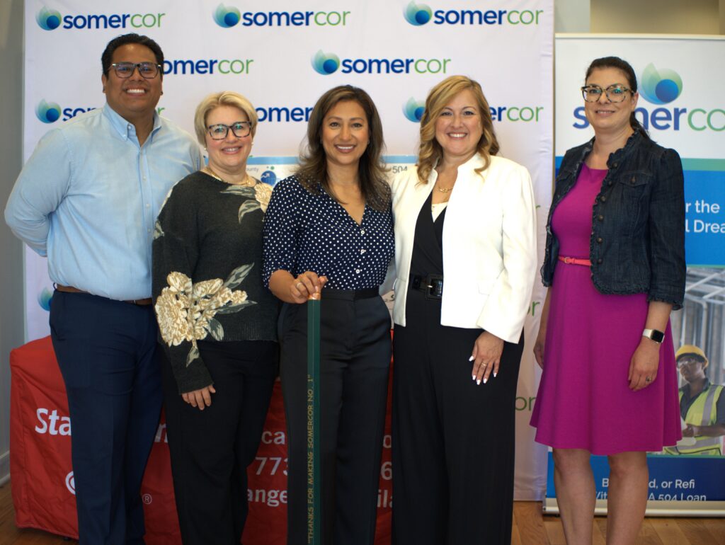 Angelica Garcilazo (center) with the Cook County Small Business Source