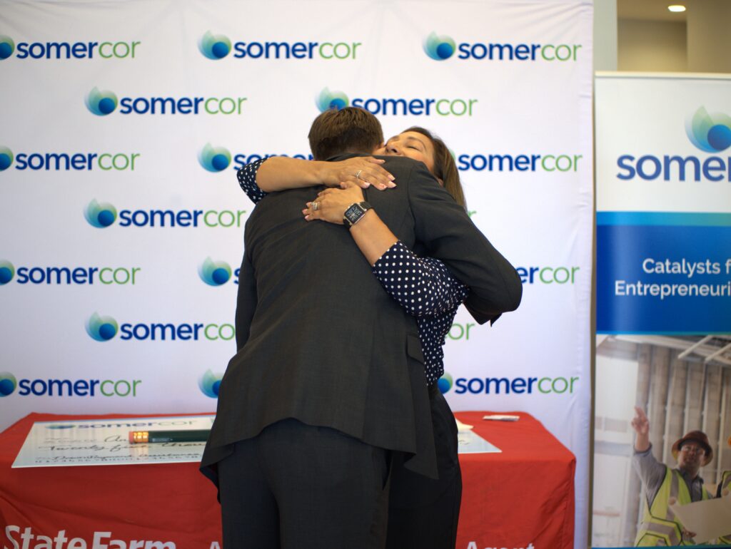 Eric Bacon and Angelica Garcilazo hugging